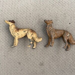 Vintage cast iron dogs.